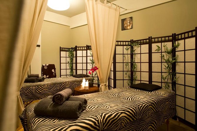 1-Hour Aroma Oil Massage plus 20-Minute Free Fish Pedi - A fish pedicure and massage in the middle of Athens