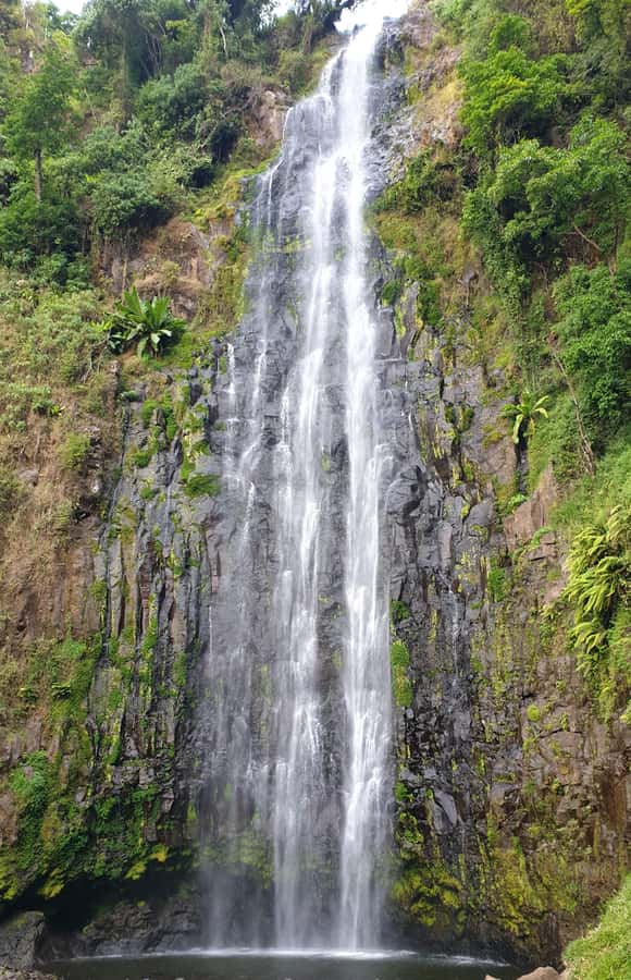 Arusha: Materuni Waterfalls, Hot Springs and/or Coffee Tour - Walking down to an 85-meter waterfall