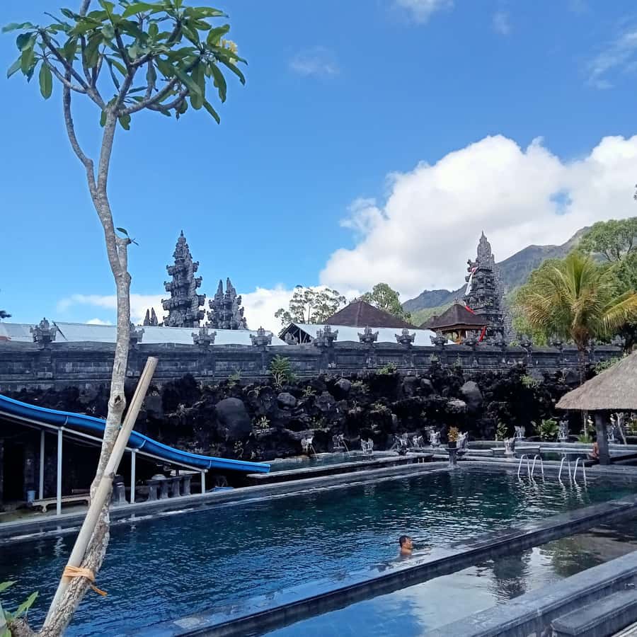 Bali: Batur Natural Hot Spring Entrance Ticket - Ten pools, rock walls, and a view of Mount Batur
