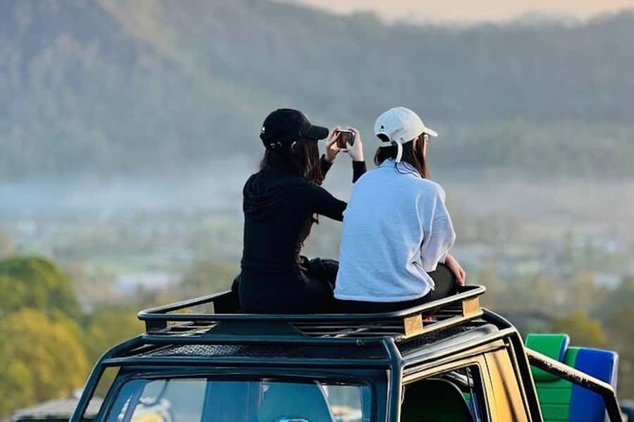 Bali: Shared Mount Batur Sunrise Jeep Tour with Hot Springs - Sunrise above the clouds