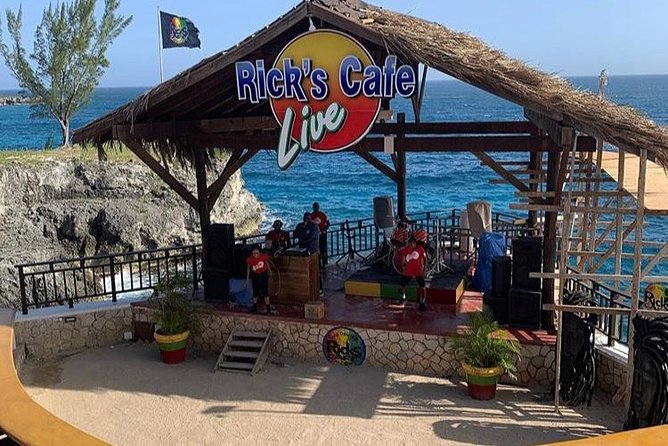 Bamboo Rafting and Limestone Foot Massage with Ricks Cafe Private Tour - Optional glass-bottom boat ride