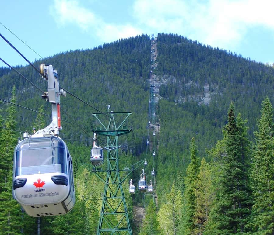 Banff: Gondola, Hot Springs, Bow falls & Three lakes tour - Lake Louise gives the day its postcard opening