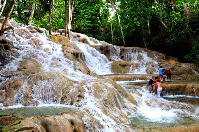 Dunn's River Falls + Bamboo Rafting With Limestone Foot Massage - From Montego Bay to Jamaica’s north coast