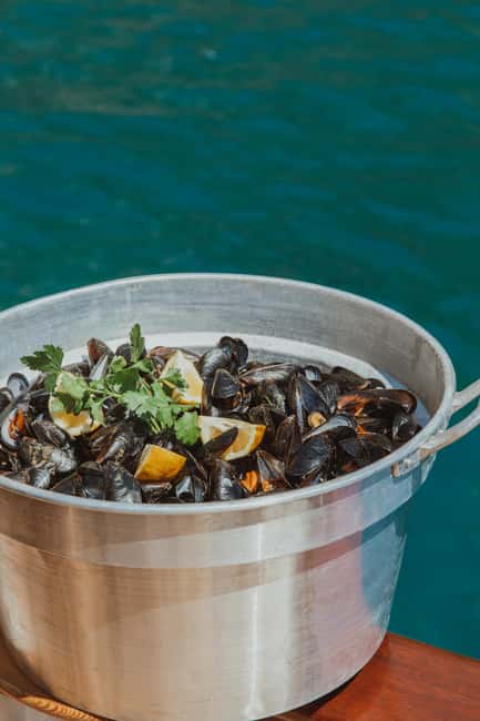 Explore Ischia by Sea: Swimming, Relaxation, Local Flavors - Seeing Ischia, the castle, and the northern coast