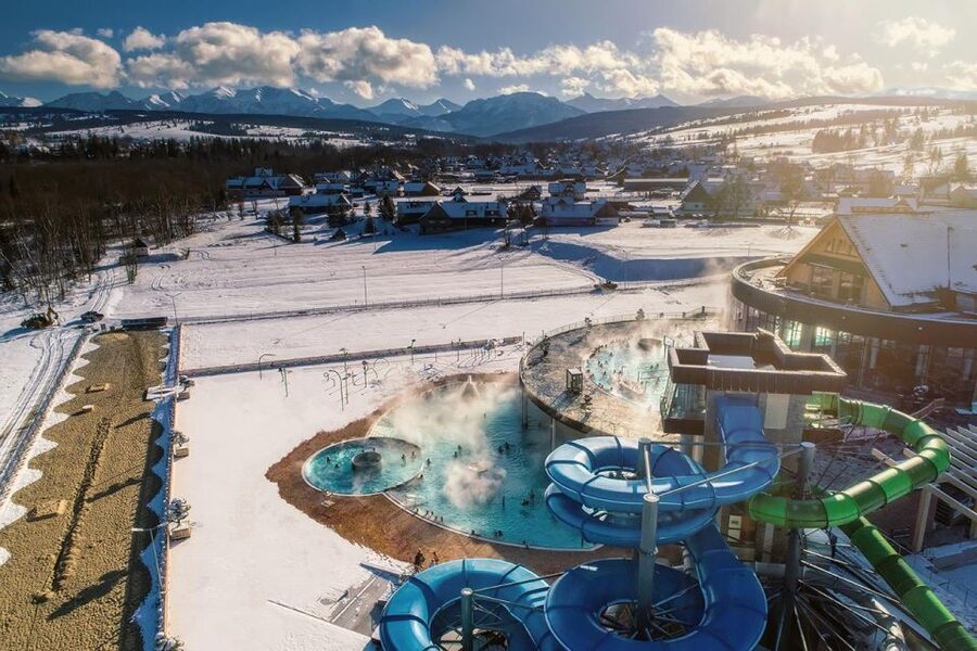 From Krakow: Snowmobile adventure and Thermal Baths tour - Grilling oscypek in Zakopane