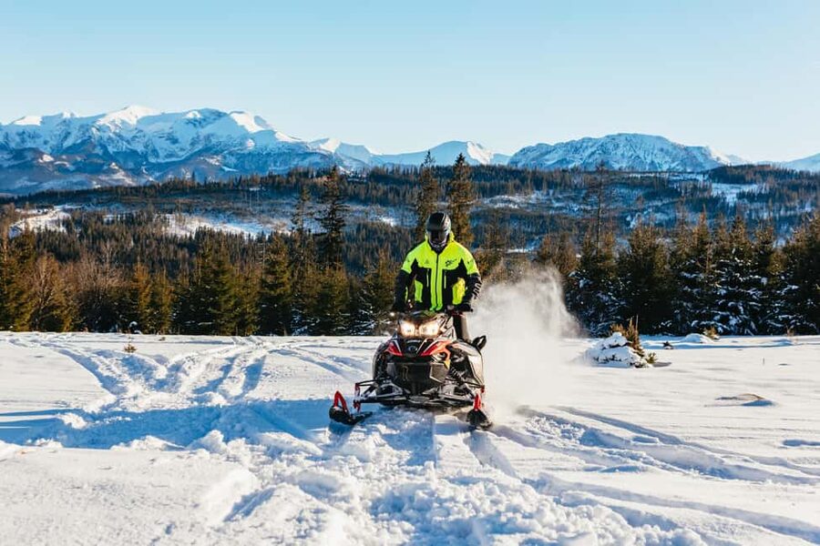 From Krakow: Snowmobile Adventure with Thermal Pools Visit - Transport, timing, and guide quality