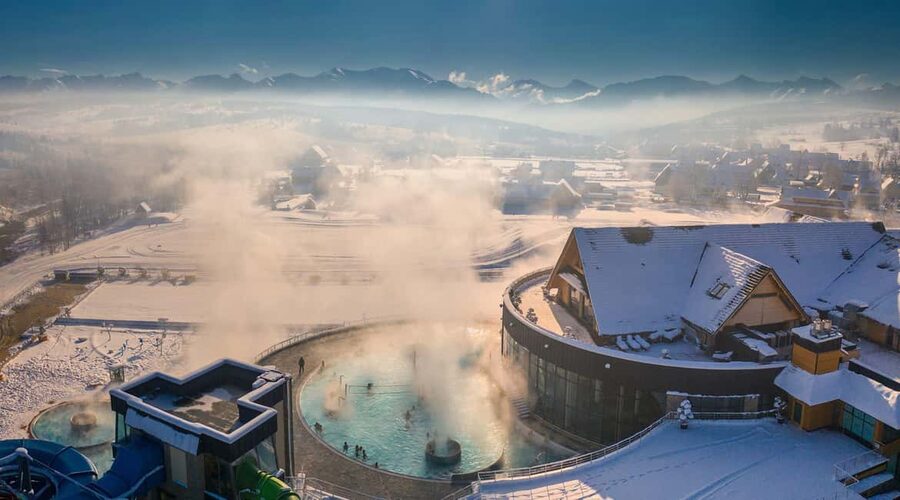 From Kraków: Thermal Baths Evening or Morning Experience - Outdoor water, terraces, and Tatra views