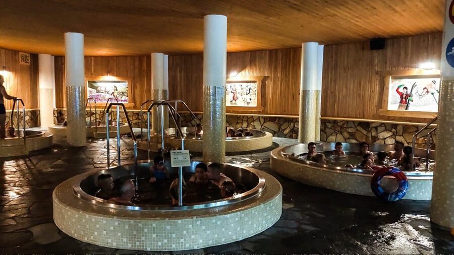 From Kraków: Thermal Baths Evening or Morning Experience - Slides, hot tubs, and quieter corners