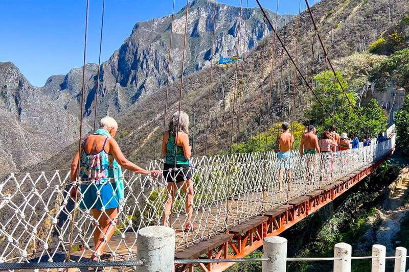 From Mexico City: Tolantongo Hot Springs Day Trip with Guide - The river, suspension bridge, and surrounding trails