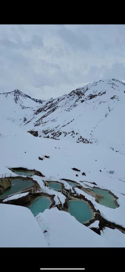 Full-Day Embalse del Yeso & Hot Springs Tour from Santiago - A mountain picnic with cheese and Chilean wine