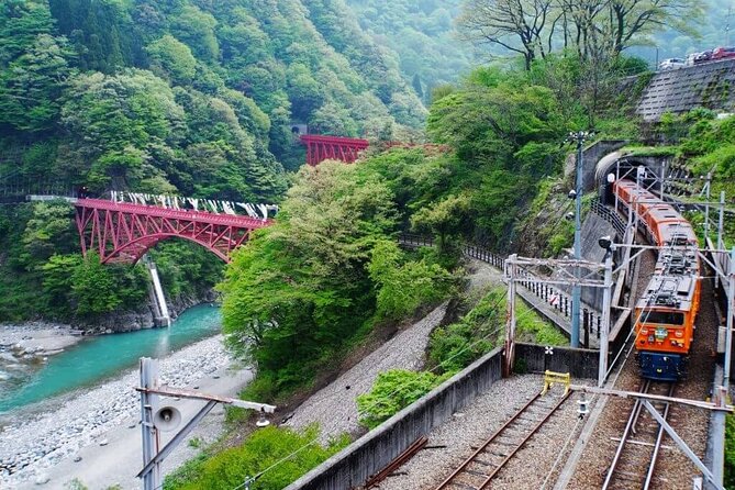 Full Day Tour to Kurobe Gorge and Unazuki Onsen from Kanazawa - Walking beside onsen-water rivers