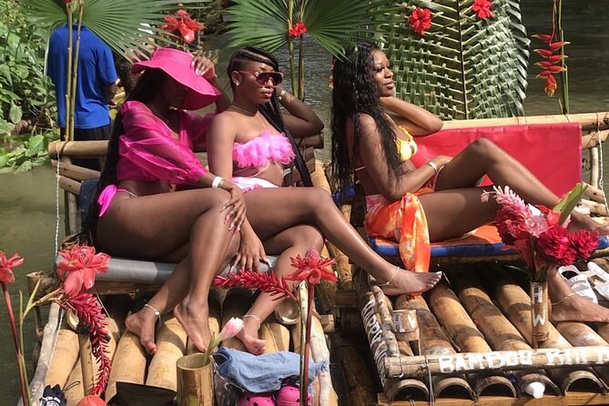 Great River Bamboo Rafting and Limestone Full Body Massage Tour From Montego Bay - Swimming, rain, and the practical side of the river stop
