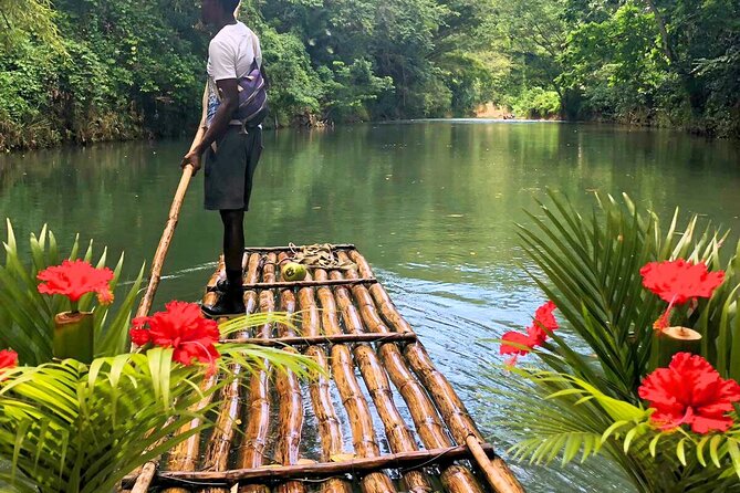 Great River Rafting with Limestone Massage & Rasta Safari Experience Combo Tour - A bamboo raft on the Lethe River