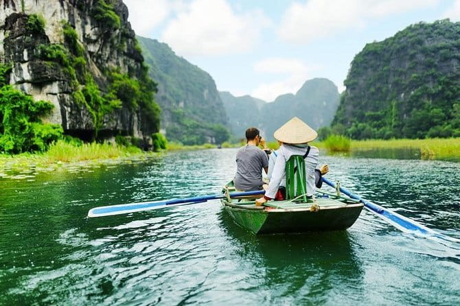 Halong Bay Day Tour Luxury Cruise With Jacuzzi and Buffet Lunch - Kayaking or a bamboo boat around the bay