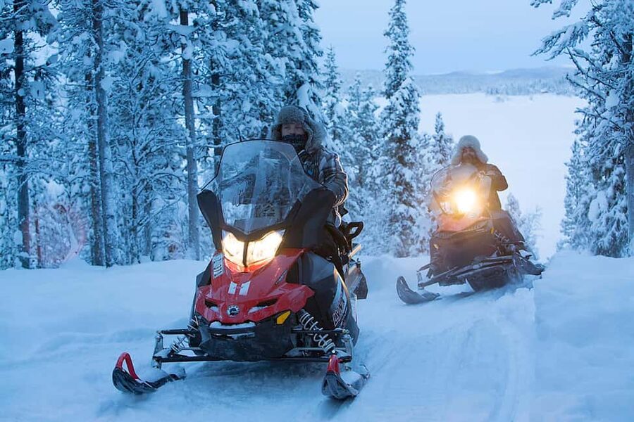 Kiruna: Overnight Snowmobile Tour with Dinner and Sauna - A cabin night with shared facilities