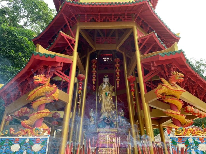 Krabi: Tiger Cave, Hot Springs and Emerald Pool Jungle Tour - Hot Spring Waterfall: warm water in a shaded forest
