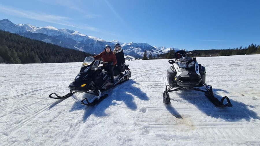 Krakow: Snowmobile & Thermal Baths Zakopane Full Day Tour - Chochołow, wooden houses, and highlander craft