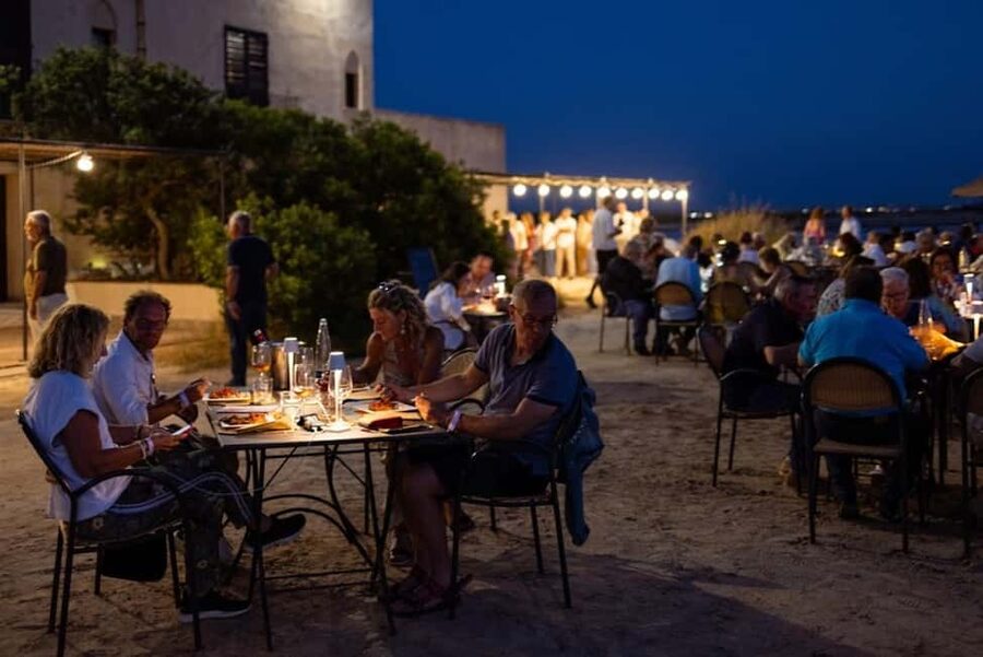 Marsala: Wellness in the Pink Salt Pans with Dinner - Reaching the Island by Boat