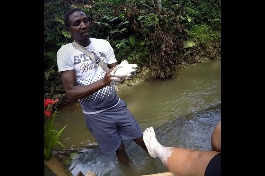 Montego Bay: Bamboo River Rafting and Limestone Foot Massage - Boarding a bamboo raft on the Great River