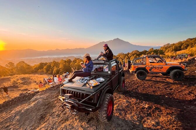 Mount Batur Sunrise Jeep Tour with Natural Hot Spring - Watching sunrise above Mount Batur