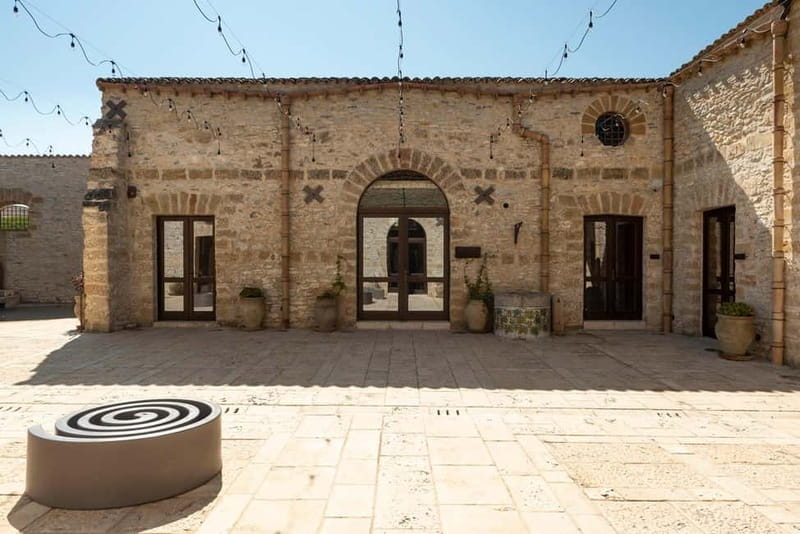 Nature and relaxation by the pool at Baglio Passofondo Estates - A pool day with a strong sense of place