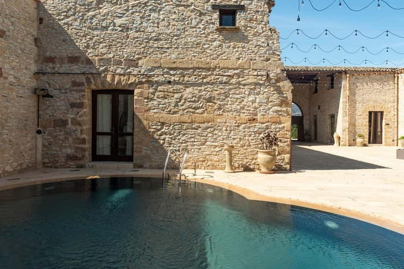 Nature and relaxation by the pool at Baglio Passofondo Estates - What your four hours look like