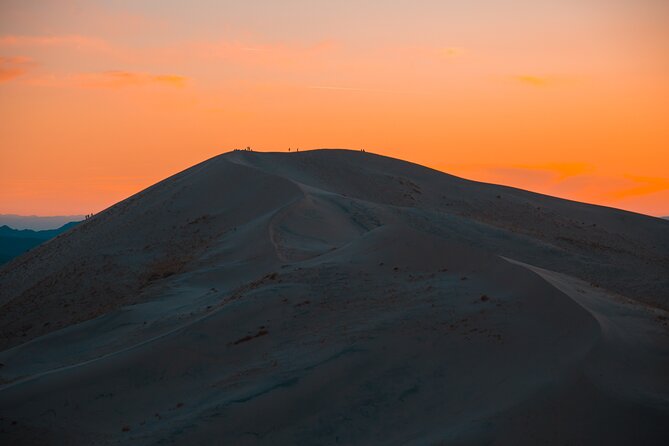 No Rush Desert Safari: 6-Hour Adventure & Inland Sea Relaxation - A short camel ride and sandboarding stop