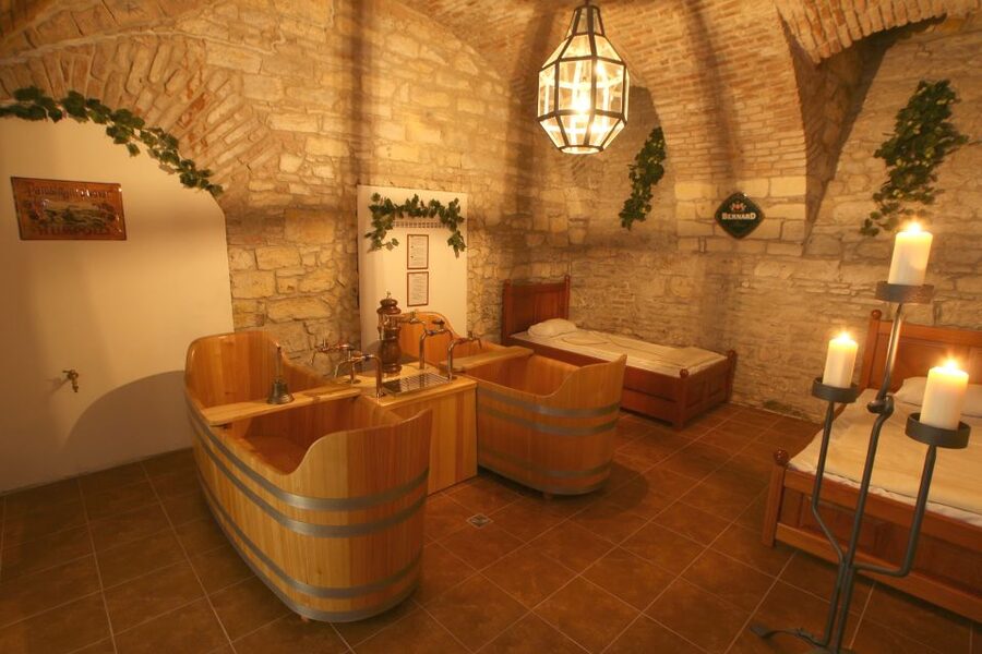 Prague: Bernard Beer Spa with Beer and Massage Option - Entering the Hotel and Getting Settled