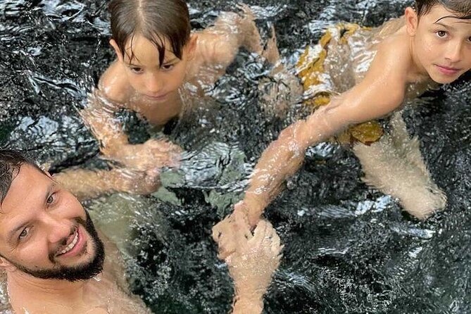 Private Tour to Marangu Waterfalls, Chagga Caves, Coffee tour & Hot Springs - Swimming, shade, and the Kikuletwa rope swing