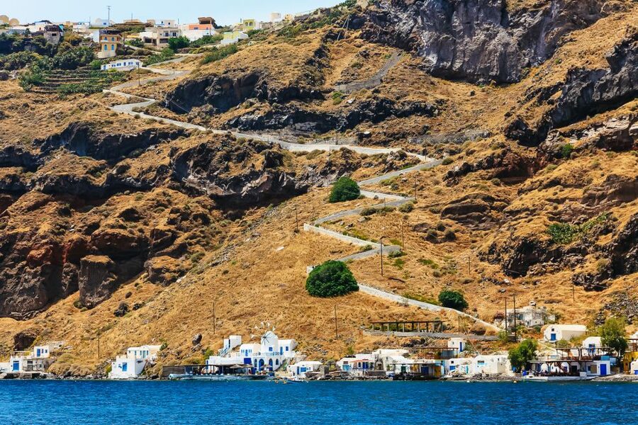 Santorini: Volcano and Hot Springs Sunset Dinner Cruise - Greek dinner, local wine, and a changing mood on board