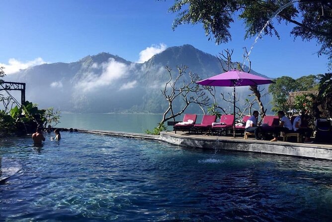 Trunyan Cemetery, Hot Spring, Penglipuran Village, and Waterfall Tour - Cooling off at Batur Natural Hot Springs
